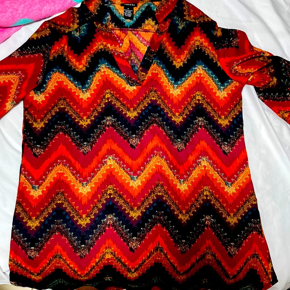 This is an 100% polyester top from the 21.